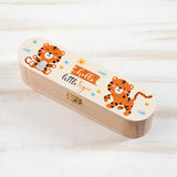 <transcy>Tigerstiftebox aus Holz</transcy>